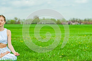 Meditation. Woman doing yoga and listening to relax music