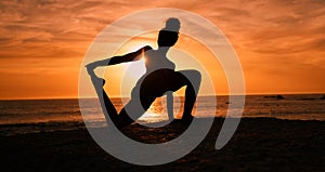 Meditation, yoga and silhouette of woman on beach at sunrise for exercise, training and pilates workout. Motivation