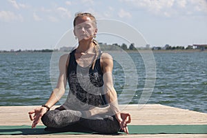 Meditation. young woman sitting in the lotus position