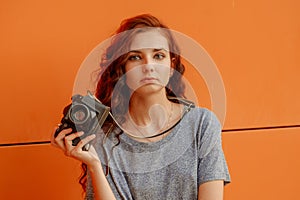 Meditative Teen Girl With Vintage Camera In Hands