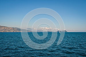 Mediteranean sea and sailing boat  against sky  in Corfu,  Greece