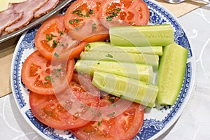 Mediteranian salad made of tomatoes and cucumbers