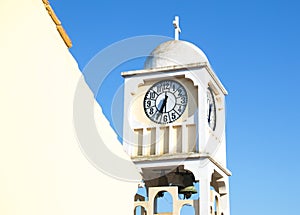 Mediterranean Architecture with an old Clock with Bells.