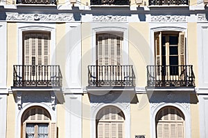 Mediterranean architecture in Spain. Old apartment building in Madrid.