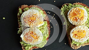 Mediterranean avocado toast with boiled egg and sesame