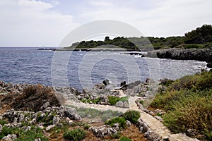 Mediterranean beach antibes pathway  rocks stones in Juan-les-Pins cap in France