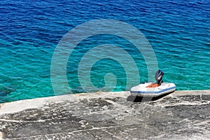 Mediterranean Beach And Rubber Dinghy