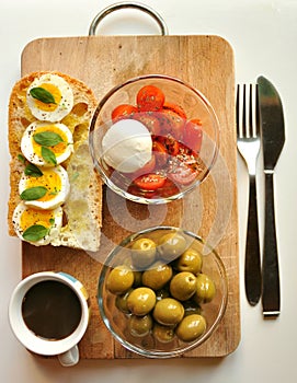 Mediterranean breakfast with coffee and sandwich