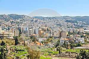 Mediterranean city historic center panorama with ruins and residential buildings in the background, Biblos, Lebanon