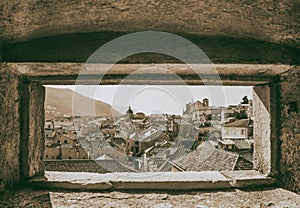 Mediterranean cityscape, in black-and-white color - top view from the fortress tower of the roofs of the Old Town of Dubrovnik