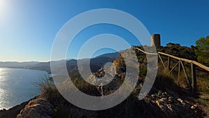 Mediterranean coastal landscape. Historic Torre Vigia De Cerro Gordo, a watchtower looking out for any marauding pirates