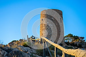 Mediterranean coastal landscape. Historic Torre Vigia De Cerro Gordo, a watchtower looking out for any marauding pirates