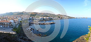 Mediterranean coastline near Aci Castello, Sicily, Italy photo