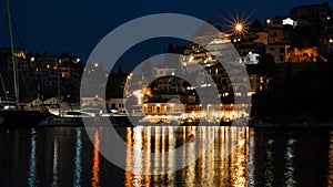 Mediterranean gem: Syvota`s main port by night