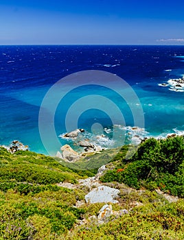 Mediterranean hidden places at Kastro, Skiathos island, Greece. Beautiful vivid panorama view of blue aegean sea coast from wild