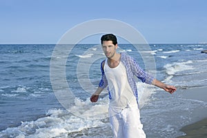 Mediterranean latin young man on beach
