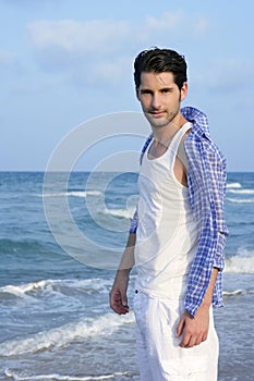 Mediterranean latin young man on beach