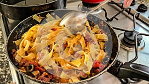 Mediterranean pasta preparation close-up