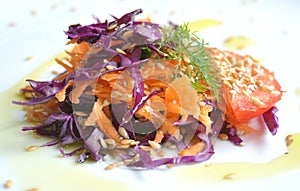 Mediterranean salad with cabbage , carrots and tomato