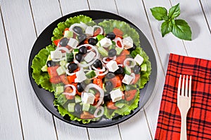 Mediterranean salad with feta cheese, tomatoes, cucumbers and olives