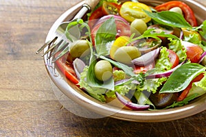 Mediterranean salad with olives, avocado