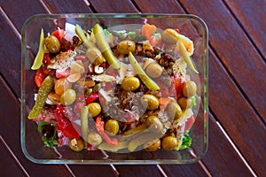 Mediterranean salad with tomato olives cucumber lettuce