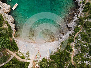 Mediterranean Sea beach At Rocky Seashore In Morning