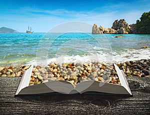 Mediterranean sea coast on a book