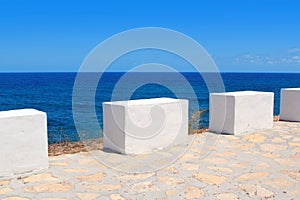 Mediterranean sea coastal view white milestones photo