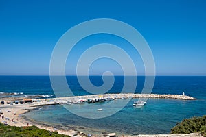 Mediterranean Sea harbor boasting beautiful blue waters at Agios Georgios Pegeias, Paphos, Cyprus