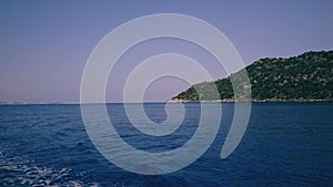 Mediterranean sea landscape view of coast and mountains from floating ship