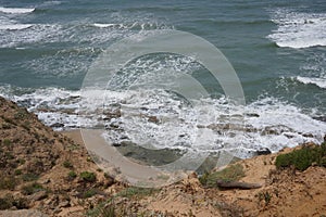 Mediterranean sea in spring. Deserted shorekurkar sandstone cliff nature reserve