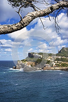 Mediterranean Serenity: Majestic Cliffs and Turquoise Waters of Port de Soller