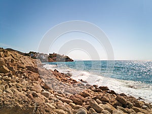 Mediterranean stone beach and sea