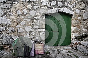 Mediterranean street and green doors