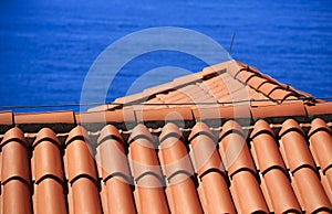 Mediterranean terracotta tiled roof with lightning conductor