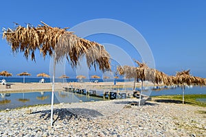 Mediterranean wild natural shore in Lebanon with  mouth of the river Nahr Ibrahim and the mediterranee sand