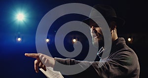 Actor performing a monologue in a theater