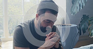 Man praying and murmuring