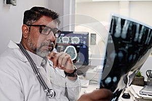 Radiographer Checking X-ray Image photo