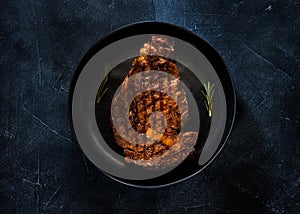 Medium rare grilled Steak Ribeye in plate
