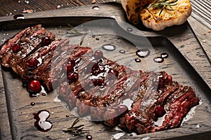 Medium Rare Skirt steak on wooden board