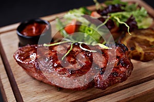 Medium rare striploin steak, grill and barbeque