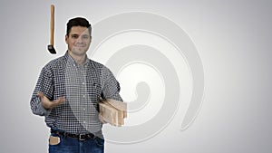 Brunette man builder with planks is ready to build something on