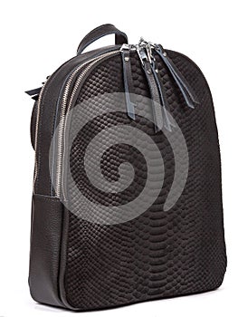 Medium size leather woman's balck backpack isolated on white background