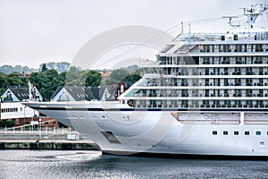 Medium-sized cruise ship in the port of Rostock - WarnemÃÂ¼nde Germany photo