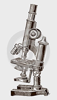 Medium sized inclinable optical microscope with a square stage