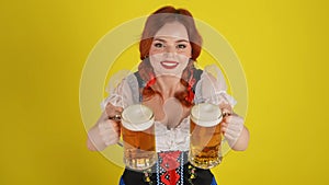 Medium yellow background isolated shot from above of a young German woman, waitress shot from above wearing a