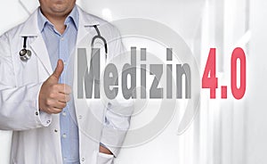 Medizin 4.0 in german Medicine concept and doctor with thumbs photo