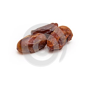 Medjool dates isolated on a white background.